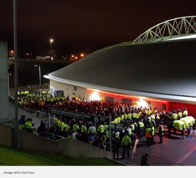 Crystal Palace fans being contained by Sussex Police outside the Amex Stadium after the match had kicked off. 
